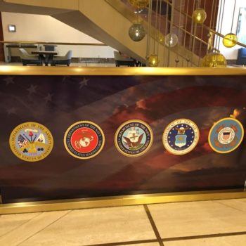 Large banners with enlarged images of fishing poles and fish 