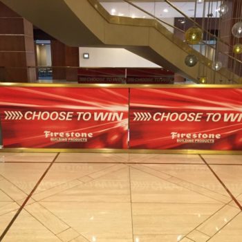 Large banners with enlarged images of fishing poles and fish 