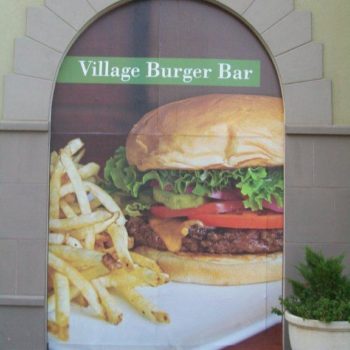 Large banners with enlarged images of fishing poles and fish 