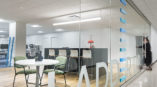 Ladder Up custom window graphic in office. 