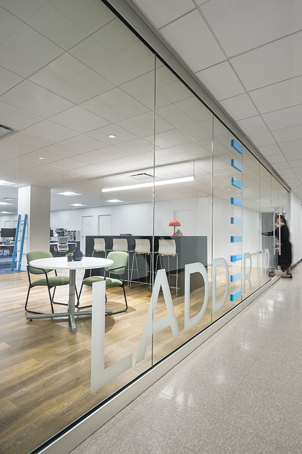 Ladder Up custom window graphic in office. 